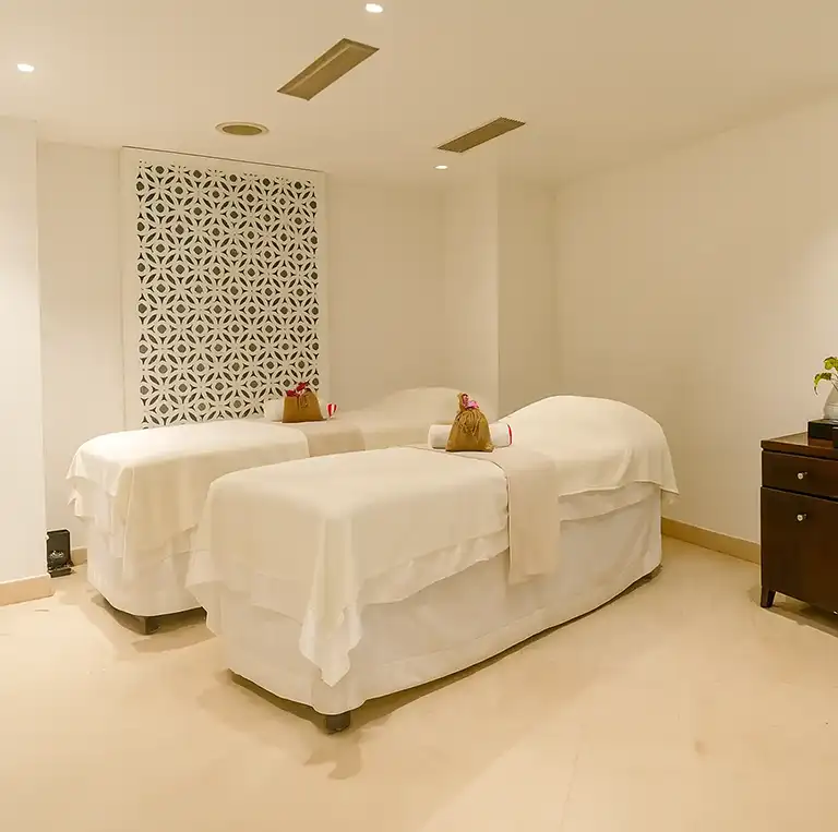 Couple therapy room at The Spa in Lemon Tree, Sector-29, Gurugram designed for relaxing spa treatments.