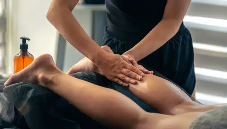 Guest receiving a deep thigh massage at Tattva Spa to ease muscle tension, improve circulation, and support relaxation.