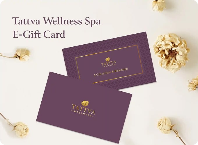 Tattva spa purple gift cards with gold text and flowers