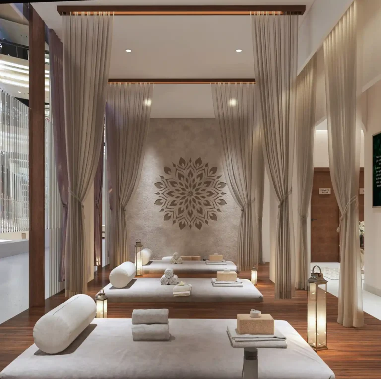 Serene relaxation lounge at Tattva Wellness Spa – M3M 65th Avenue Gurgaon, featuring floor seating, soft drapes, and calming ambient lighting.