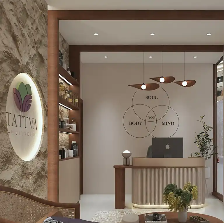 Elegant reception at Tattva Wellness Spa – M3M 65th Avenue, Gurgaon, designed with warm lighting, natural textures, and a soul–body–mind wellness theme.
