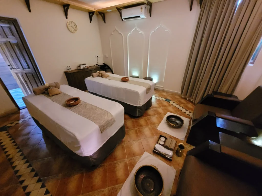 Luxurious couple spa therapy room at Tattva Wellness Spa with dual massage beds in Goa.