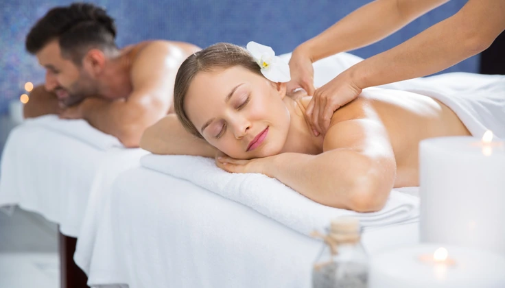 Couple enjoying a relaxing spa massage with Tattva Tranquility Membership.