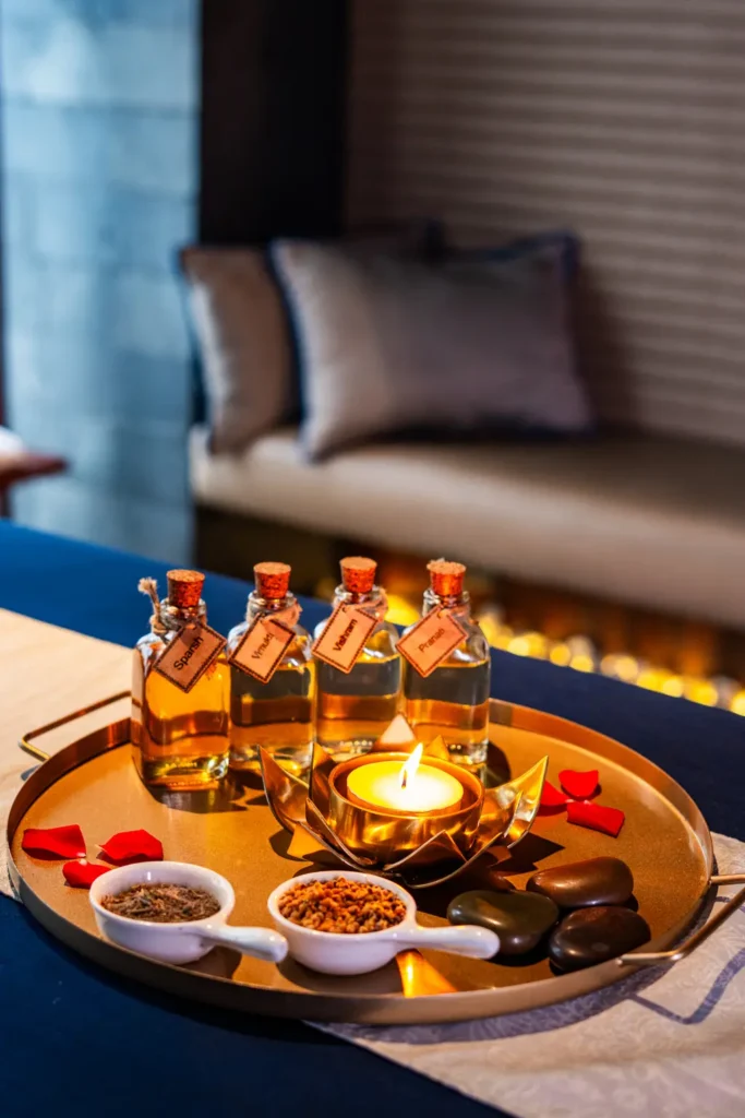 Aromatherapy Massage essential oils displayed on plate.