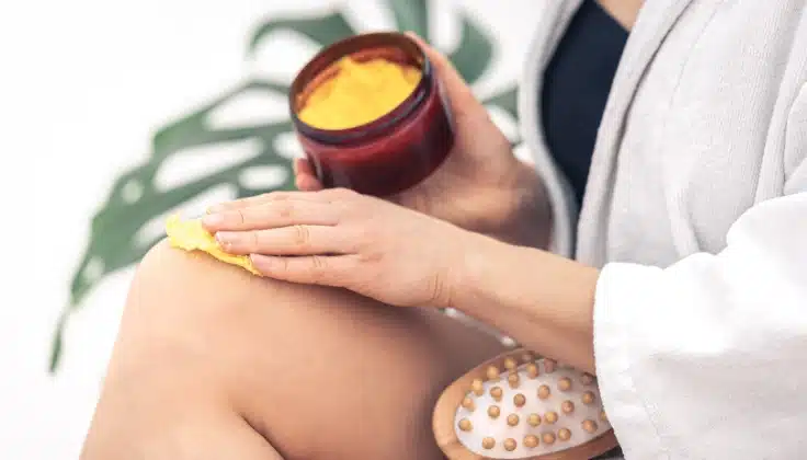 “Woman enjoying a relaxing body scrub treatment”