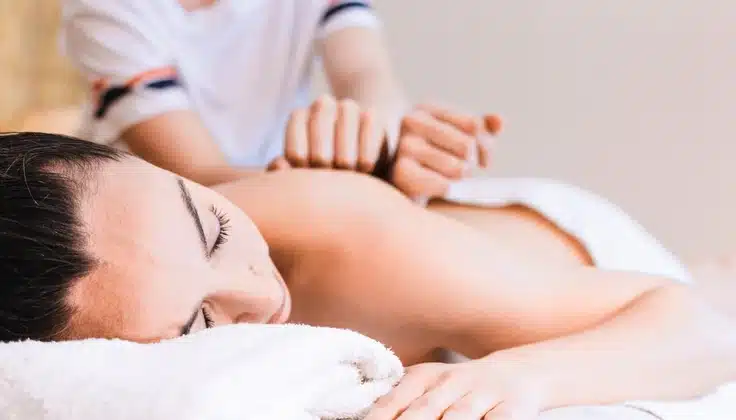 Woman enjoying a relaxing massage at the Best Spa at Marriott Hotels India, designed to promote wellness, relaxation, and rejuvenation.