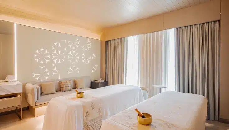 Luxury premium spa treatment room at Qoros Spa by Tattva, designed for a relaxing and elevated wellness experience.