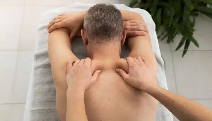 Guest receiving an upper back massage at Tattva Wellness Spa in Mumbai.