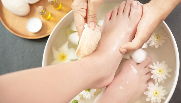 Foot scrub treatment during a relaxing spa pedicure