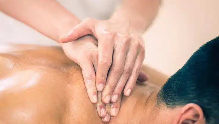 Guest enjoying a Swedish massage in Pune at Tattva Wellness Spa.