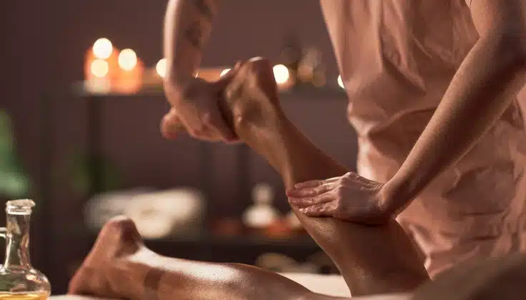 Guest receiving Foot Reflexology to ease tired feet and support relaxation at Tattva Wellness Spa.