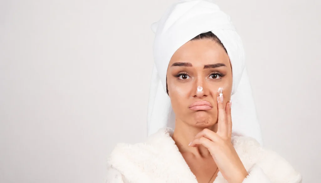 Woman concerned about dull skin before experiencing the benefits of a Shine Facial.