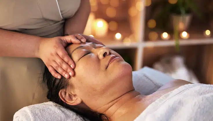 Guest receiving head massages to ease tension and promote relaxation.