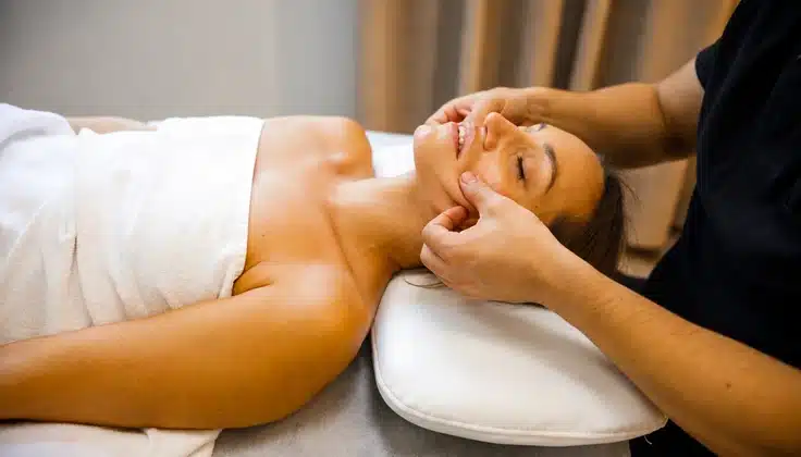 Guest receiving Lymphoglow Rejuvenation with gentle facial massage techniques for a refreshed and relaxed appearance.