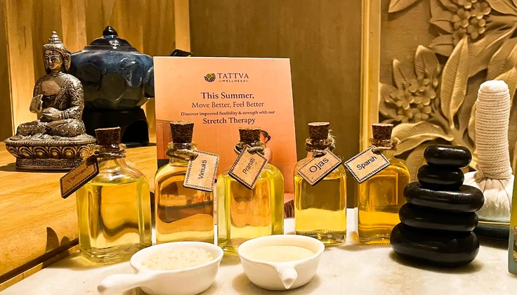 Massage oils and wellness essentials displayed at a luxury day spa.